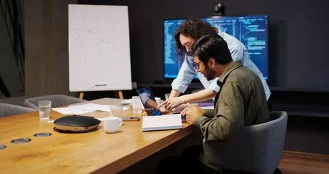 Design review session, collaborative team deeply analyzing user interface Stockfoto's