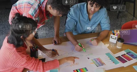 Design team drawing circle, sketching mind map, choosing colors while social Stock Footage 330397318
