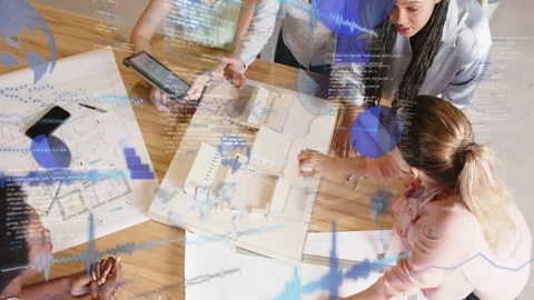 Design team five women pointing at model, holding tablet and causing blue Stock Footage 333648124