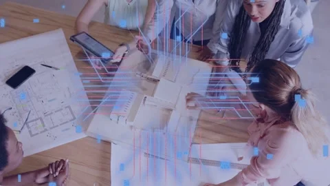 Design team leaning over model, tapping tablet and activating holographic Stock Footage 333689478