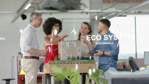 Design team meeting around model, man using tablet starting AR labels showing Stock Footage 332897552