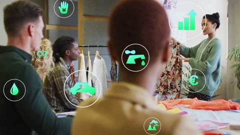 Design team pointing while presenter holding dress, green icons circling dress Stock Footage 333574982