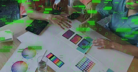 Design team sitting swapping mockups tapping screens revealing green code 스톡 동영상 318115776