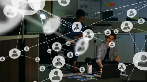 Design team tapping tablet, reviewing layouts for project, causing network Stock Footage 329786165
