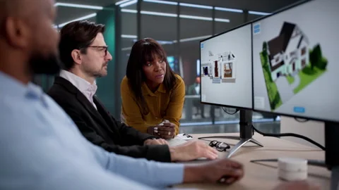 Design Team Viewing Property Floor Plan Stock Footage 329677482