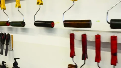 Design tools hanging on the wall Stock Footage 98623559