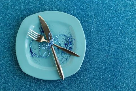 Designed Elegant Christmas Table with a blue plate and cutlery Stock Photos