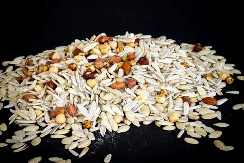 Designed a heap of shelled nuts varieties Stock Photos