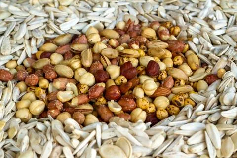 Designed a heap of shelled nuts varieties Stock Photos