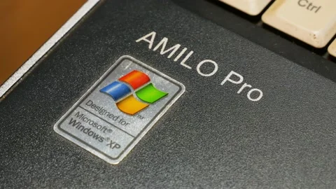 Designed for Microsoft Windows XP, Amilo Pro laptop, old netbook outdated Stock Footage 162110463