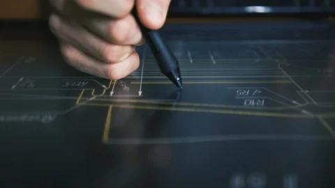 Designer Architect engineer Working With Drawings on hi tech Tablet Stock Footage 103229587