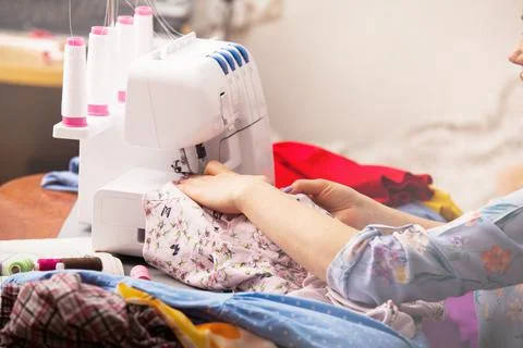 Designer with arms folded in a bright creative office 스톡 사진