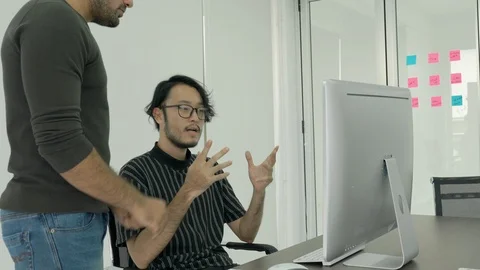 Designer artist explaining ideas to creative manager and meeting together. Stock Footage 108605335