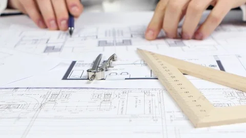 Designer checks the data for the reconstruction of the store. Close up Stock Footage 73683273