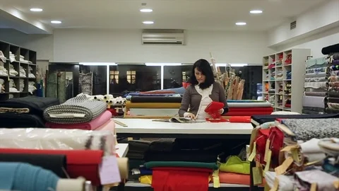 The designer chooses the fabrics Stock Footage 86274747