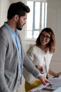 Designer choosing color with client Stock Photos