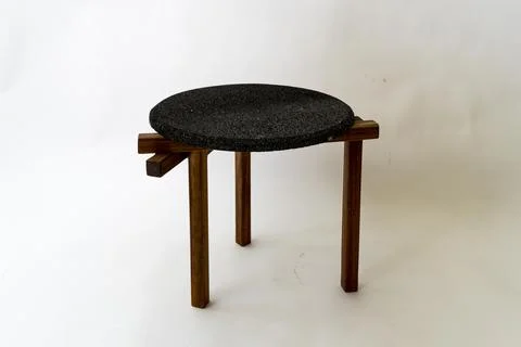 Designer coffee table, solid wood base and top in terrazzo, oak wood on white Foto stock