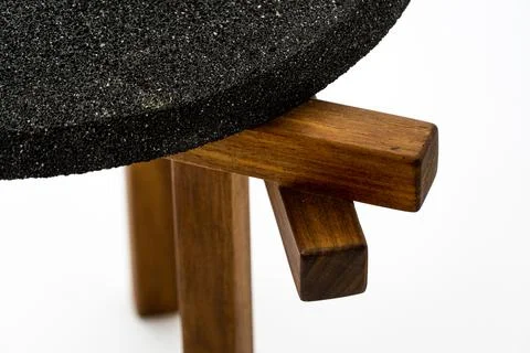 Designer coffee table, solid wood base and top in terrazzo, oak wood on white Stock-Fotos