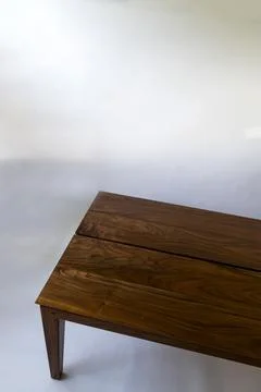 Designer coffee table, solid wood base and top in terrazzo, oak wood on white Stock Photos