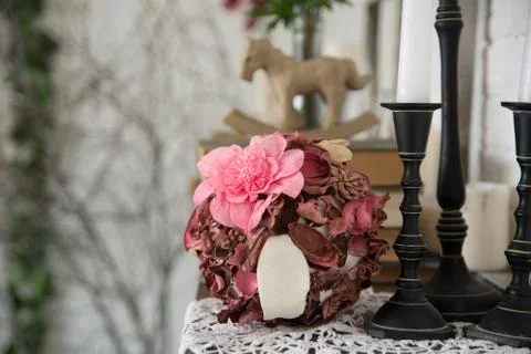 Designer composition with artificial and dried flowers. 写真素材