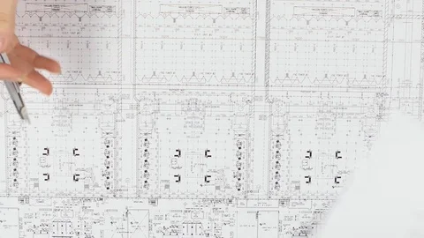 Designer corrects errors made in the drawn drawings. Close up Stock Footage 73677833