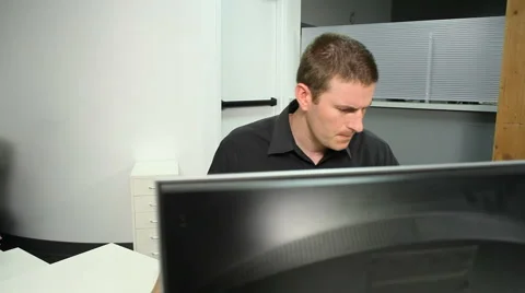 Designer at desk with object Stock Footage 61656580