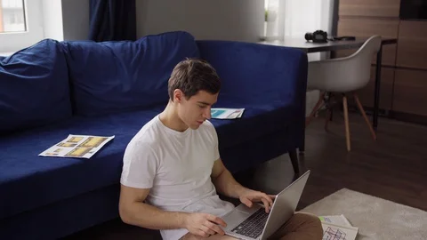 Designer discussing interface templates during video call Stock Footage 128760100