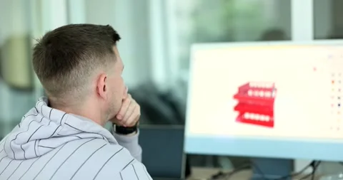 Designer drawing 3D model of building on computer for printing on printer Stock Footage 270548222