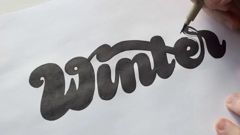 Designer drawing letters with marker Stock Footage 72222624