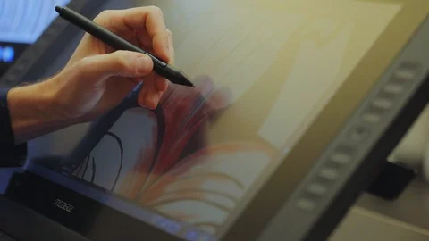 The designer draws on a graphics tablet. Working with interactive pen display Видео 124322664