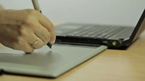 Designer edit on your computer using a graphic tablet Stock Footage 60768332