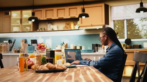 Designer engineer uses architectural software remodeling on laptop Stock Footage 344244920