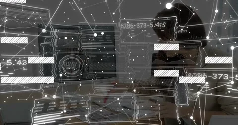 Designer glancing between screen and papers, activating node overlay showing 動画素材 331126036
