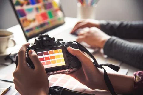Designer graphic creative ,creativity woman  working on camera and designing Stock Photos