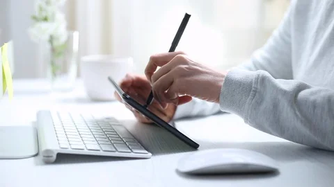 Designer illustrator draws on a graphic tablet. Stock Footage 128794617