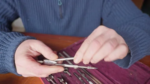 Designer Inspects Drafting Instruments, Careful Evaluation of Precision Tools Vídeo Stock 333461664