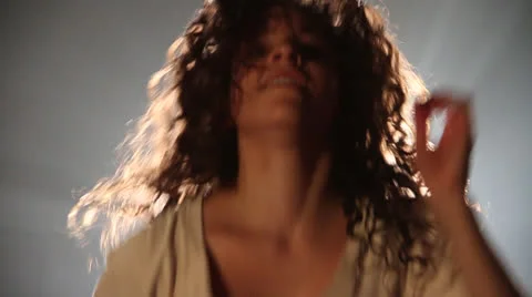 Designer lady dances in front of camera with good environment set. Stock Footage 22784415