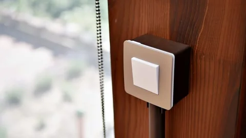 Designer light switch on a wooden column of a modern building Stock Footage 202647618