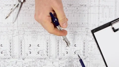 Designer looks at the data for the building's most complete building. Close up Stock Footage 73676792