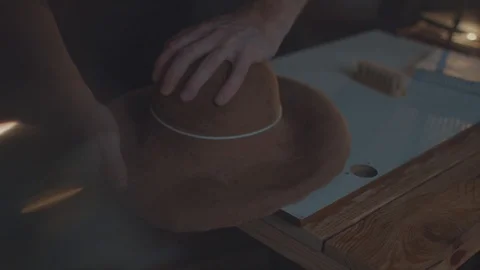 Designer makes a felt hat. Fedora hat Stock Footage 86484627