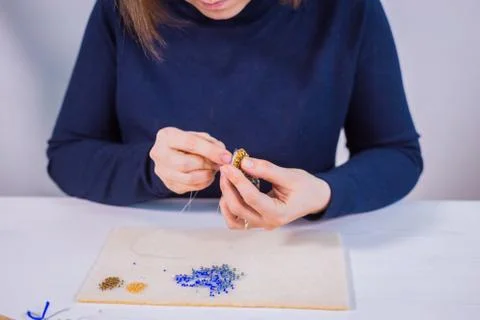 Designer making handmade brooch Stock Photos