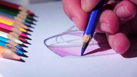 Designer smooth strokes complements blue pencil sketch. Close up. Slow motion Vídeos de archivo 73591817