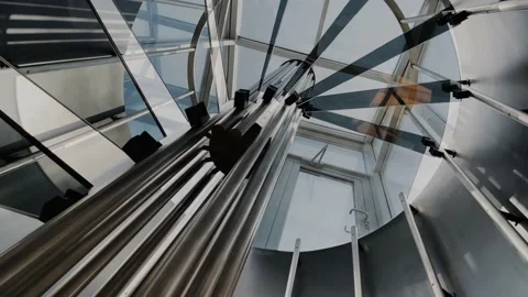 Designer spiral staircase in high-tech style leading to the roof of the house Stock Footage 159646871