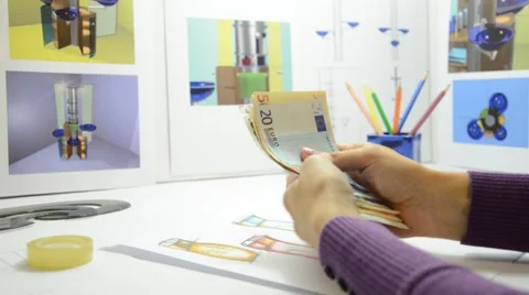 Designer in studio counting money, closeup Stock Footage 41761536
