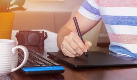 Designer with stylus pen Stock Photos