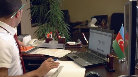 The designer takes a few notes Video stock 73363569