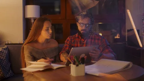 Designer Talking To Client With Laptop And Tablet. Cheerful Young Woman Approves Stock Footage 128020327