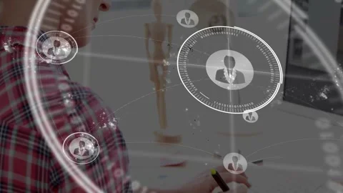 Designer tapping stylus on pen tablet and expanding social network map with Stock Footage 327965684