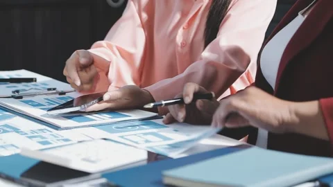 The designer team is designing the uxui system to make the uxui system work.. Stock Footage 290951921