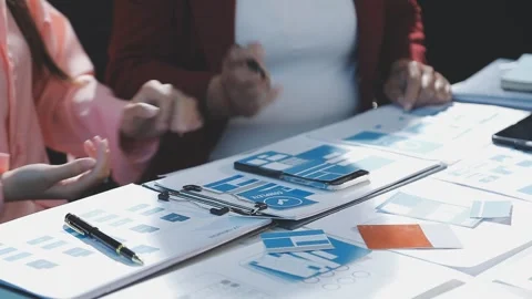 The designer team is designing the uxui system to make the uxui system work.. Stock Footage 290951962
